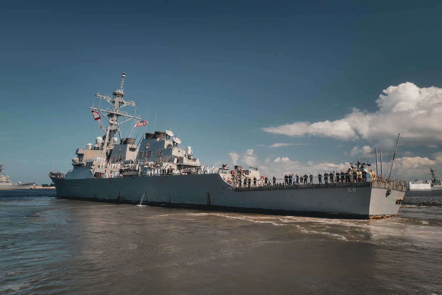 The Arleigh Burke-class guided missile destroyer USS The Sullivans (DDG 68) departs Mayport, Fla. for a scheduled deployment to the U.S. 5th Fleet area of operations. U.S. 5th Fleet encompasses about 2.5 million square miles of water area and includes the Arabian Gulf, Gulf of Oman, Red Sea and parts of the Indian Ocean. (U.S. Navy photo by Mass Communication Specialist 2nd Class Alexa H. Trafton)