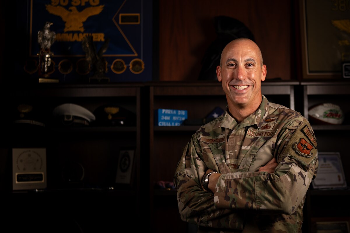 Col. Damian Schlussel, commander of the Thomas N. Barnes Center for Enlisted Education, poses for a photo in his office at Maxwell AFB-Gunter Annex, Ala., Sept. 24, 2024.