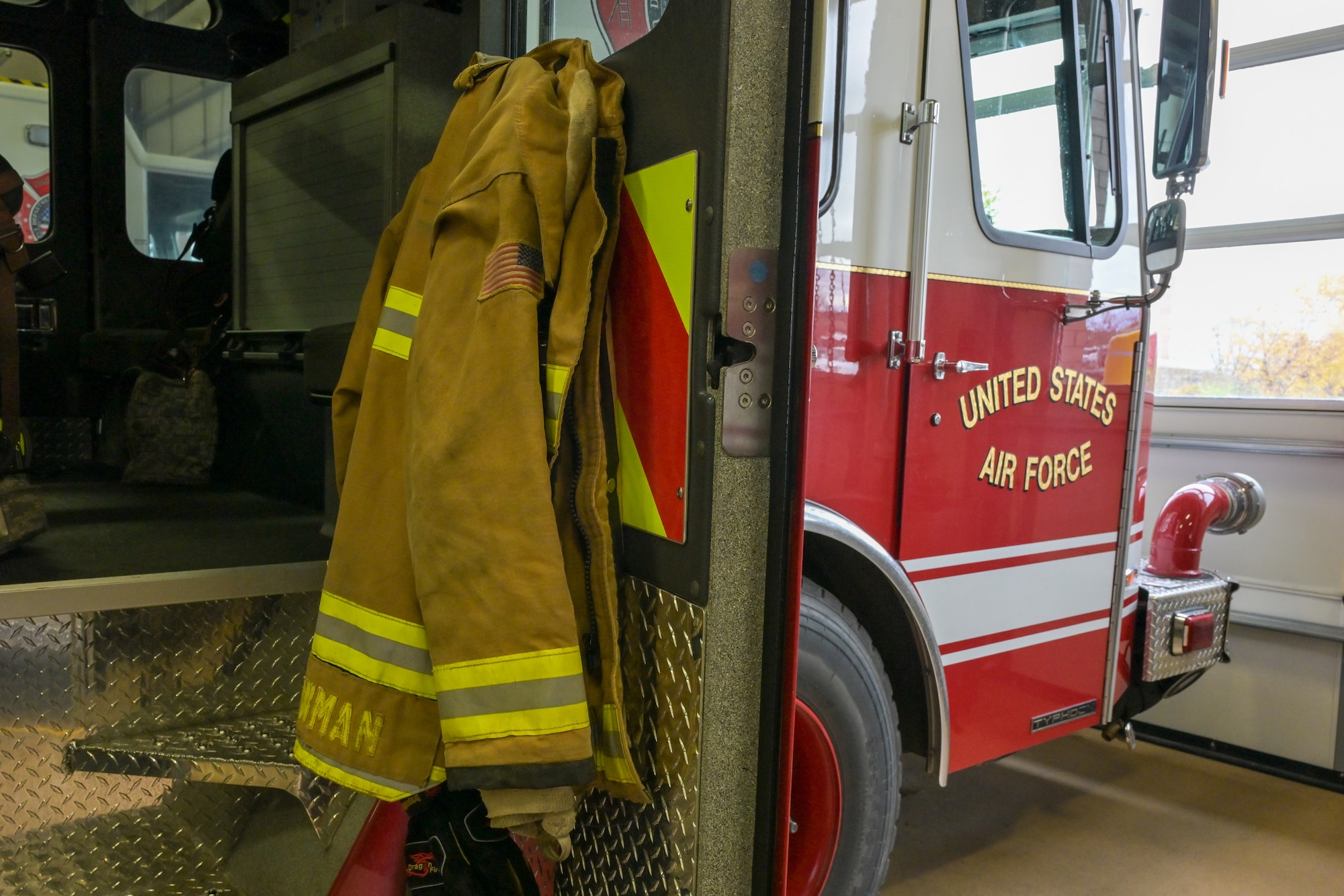 A fire truck assigned to the Niagara Falls Air Reserve Station Fire Department sits in the vehicle bay.