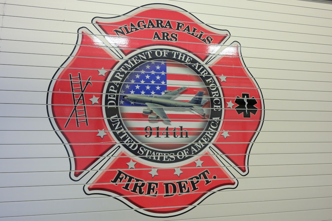 A fire truck assigned to the Niagara Falls Air Reserve Station Fire Department sits in the vehicle bay.