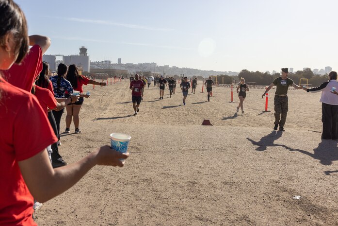 Contestants participate in the 2024 Marine Corps Recruit Depot Boot Camp Challenge, Oct. 19, 2024. For the past 23 years, MCRD San Diego has hosted the bootcamp Challenge, a three-mile obstacle course race guided by 60 drill instructors that highlights the physical and mental demands of bootcamp. The event fosters camaraderie and community engagement through interaction with MCRD personnel. (U.S. Marine Corps photo by Lance Cpl. Jacob B. Hutchinson)