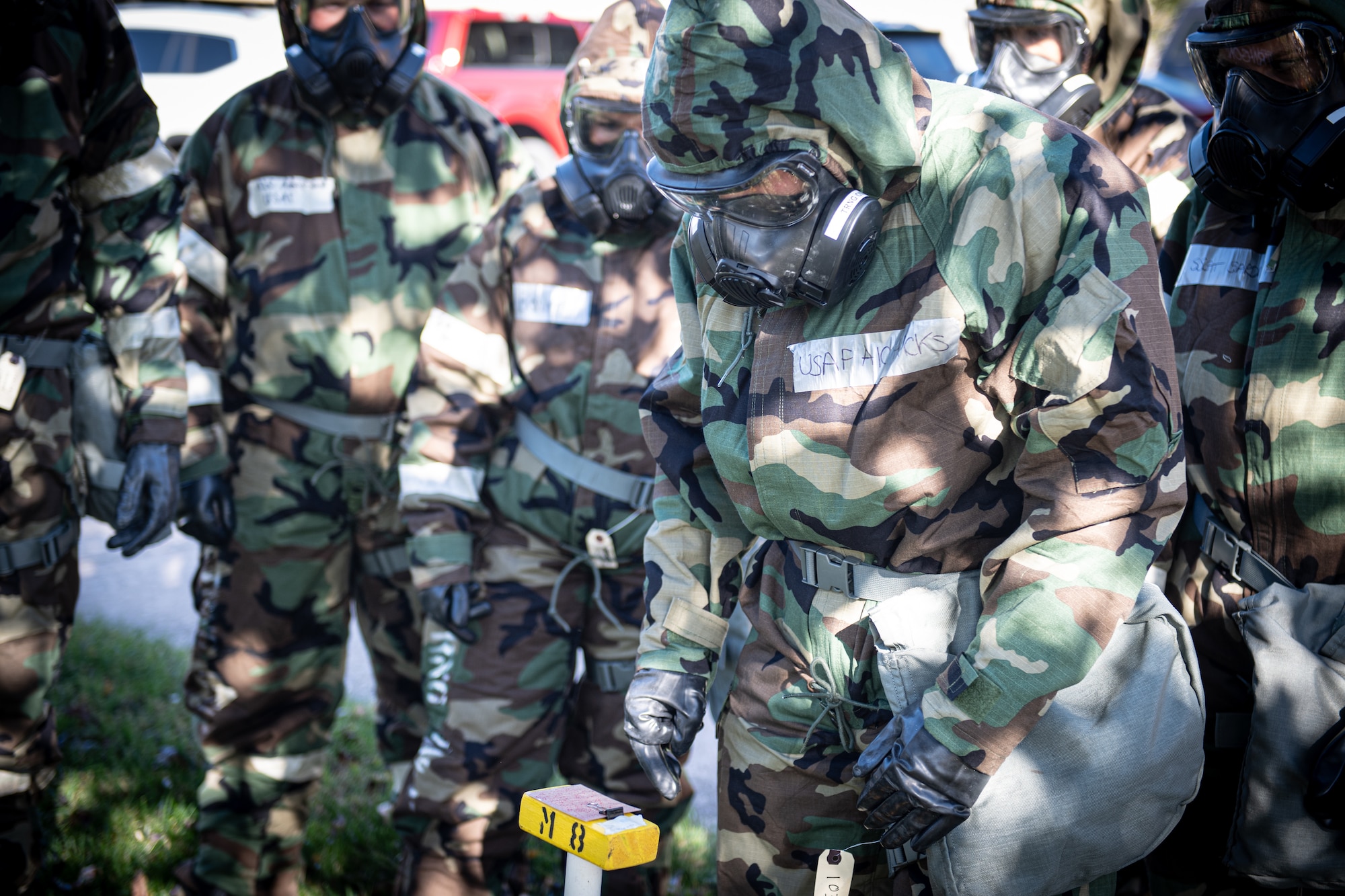A 193rd Special Operations Wing Airman evaluates M-8 paper during chemical, biological, radiological, nuclear and explosive (CBRNE) training at Middletown, Pennsylvania, Nov. 3, 2024.