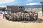Gen. Gregory Guillot, Commander, North American Aerospace Defense Command and U.S. Northern Command, and Air Force Gen. Steven Nordhaus, Chief, National Guard Bureau, stand for a photo with National Guard Adjutants General conference attendees at the Colorado National Guard’s 168th Regional Training Site, Fort Carson, Colorado, Oct. 29, 2024.