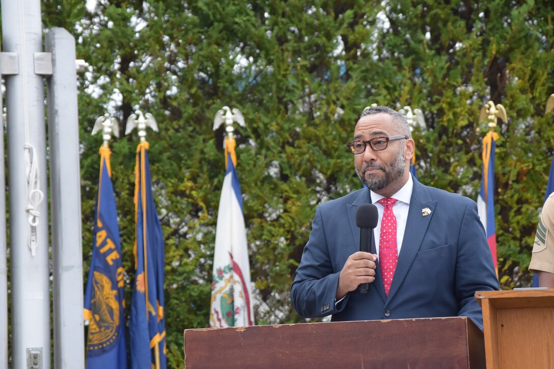 Aaron D. Snipe, minister counselor for political affairs at the U.S. Embassy in Tokyo, speaks at the 1979 Camp Fuji Fire memorial ceremony, October 18, 2024. The fire destroyed structures, injured dozens, and led to the death of 13 Marines.  (U.S. Marine Corps photo by Song Jordan)