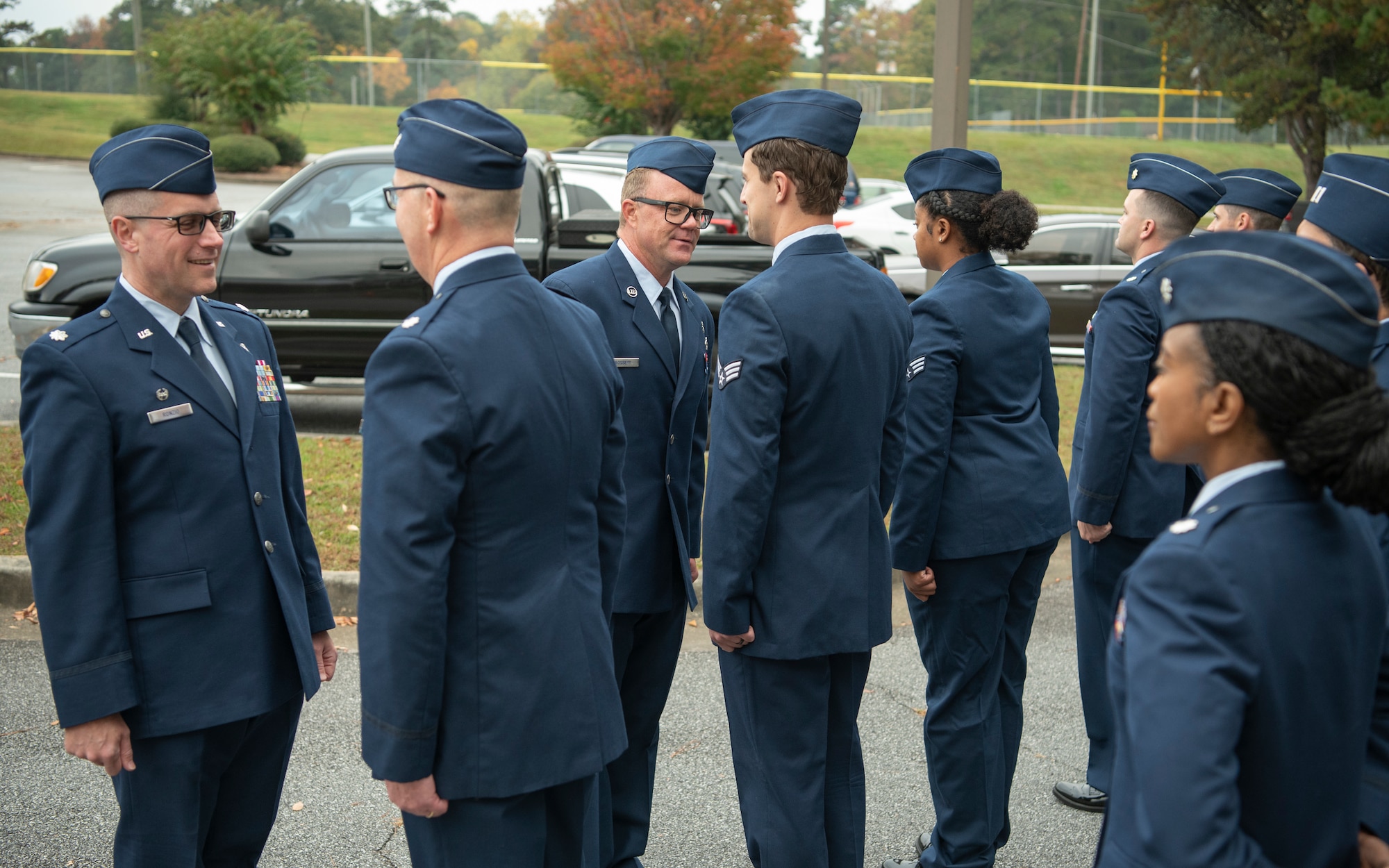 Airmen stand in formation for a blues inspection.