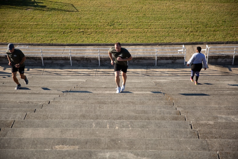 Marines and FBI students conduct physical training.