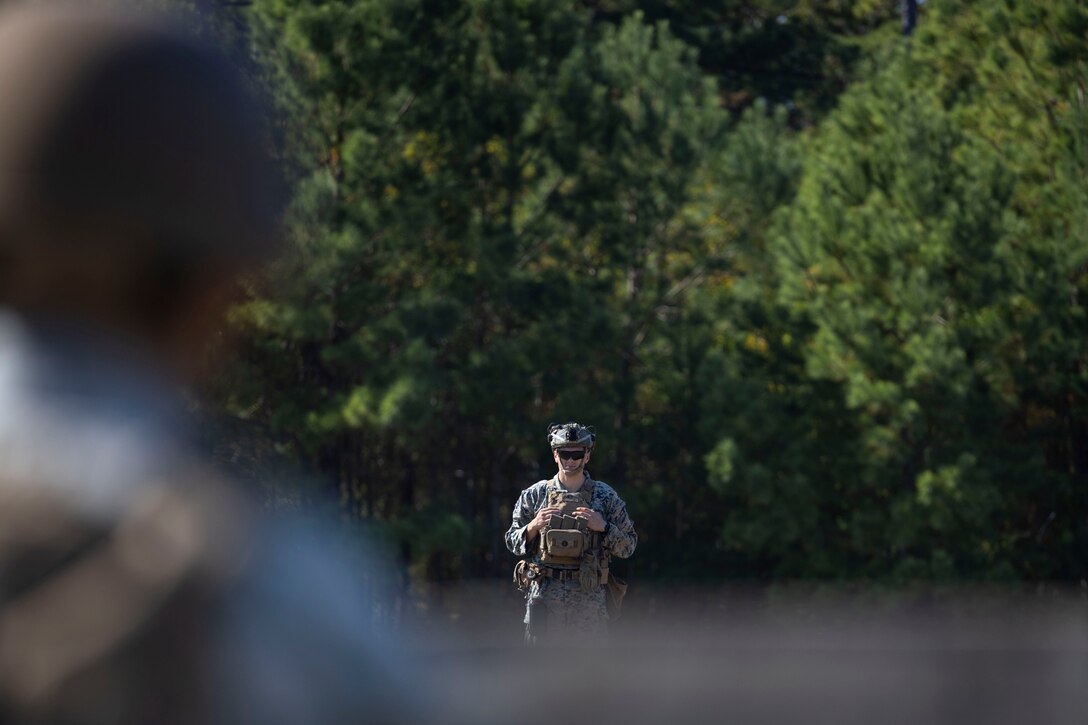 U.S. Marine Corps Cpl. Daniel Pontello, from New York, an infantry rifleman with 2nd Battalion, 8th Marines, 2nd Marine Division, participate in simulated grenade throwing drills at Marine Corps Base Camp Lejeune, North Carolina, Oct. 21, 2024. U.S. Marines with Marine Wing Headquarters Squadron (MWHS) 2, Marine Light Attack Helicopter Squadron (HMLA) 269, and HMLA-167 participated in small-unit training and live-fire ranges to support the Infantry Small Unit Leader’s Course (ISULC).  The training reinforced basic infantry skills for junior Marines and noncommissioned officers with 2nd Marine Aircraft Wing and provided ISULC students with experience in leading Marines from non-infantry military occupational specialties. (U.S. Marine Corps photo by Lance Cpl. Bryan Giraldo)
