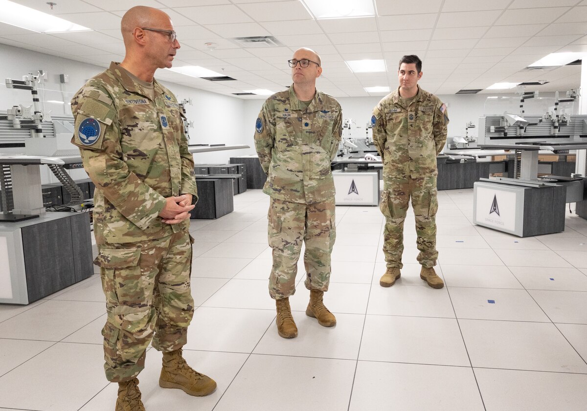 Chief Master Sgt. of the Space Force John Bentivegna views a newly renovated office space with 20th Space Surveillance Squadron.
