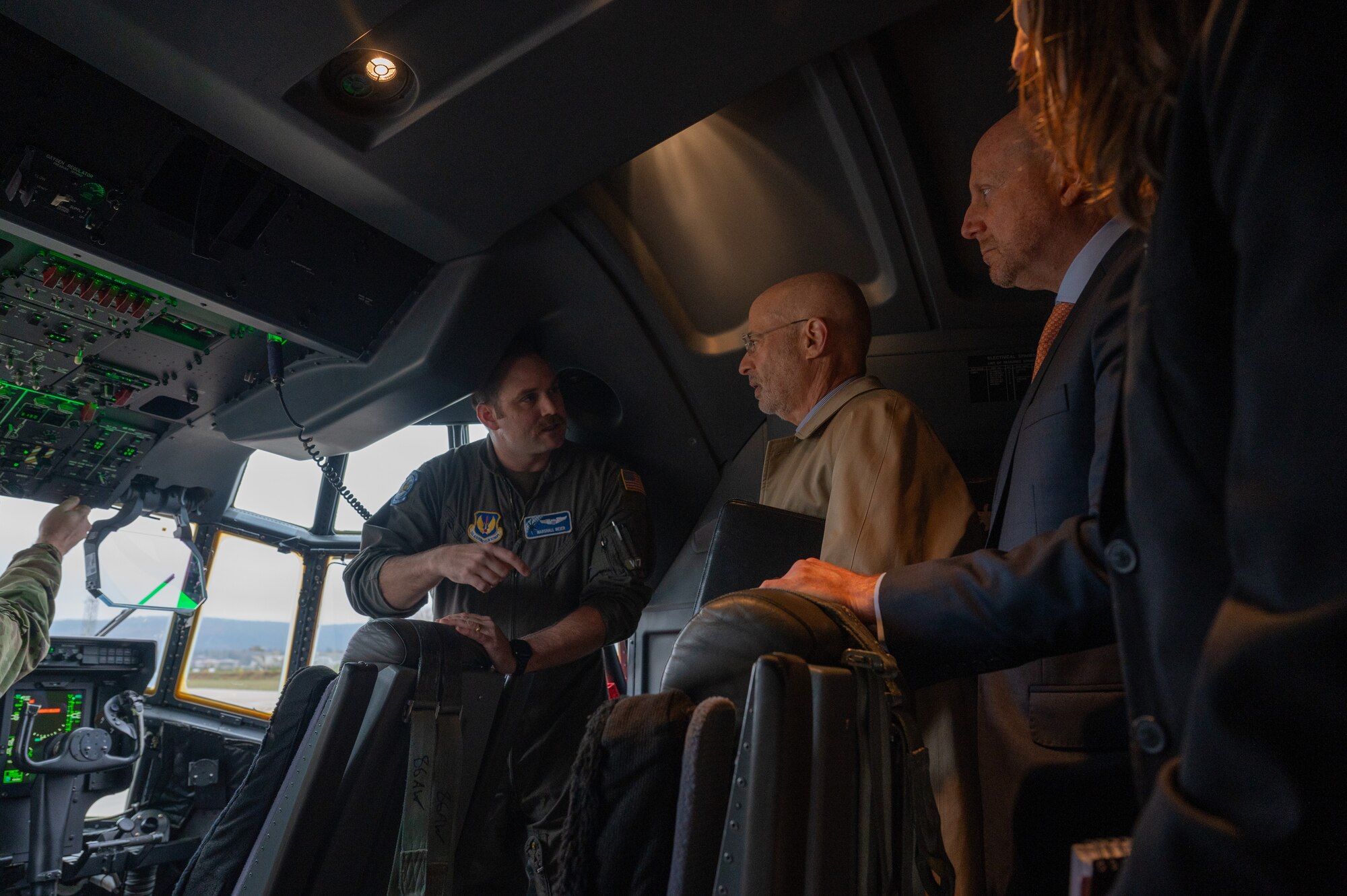 A man gives a tour to people