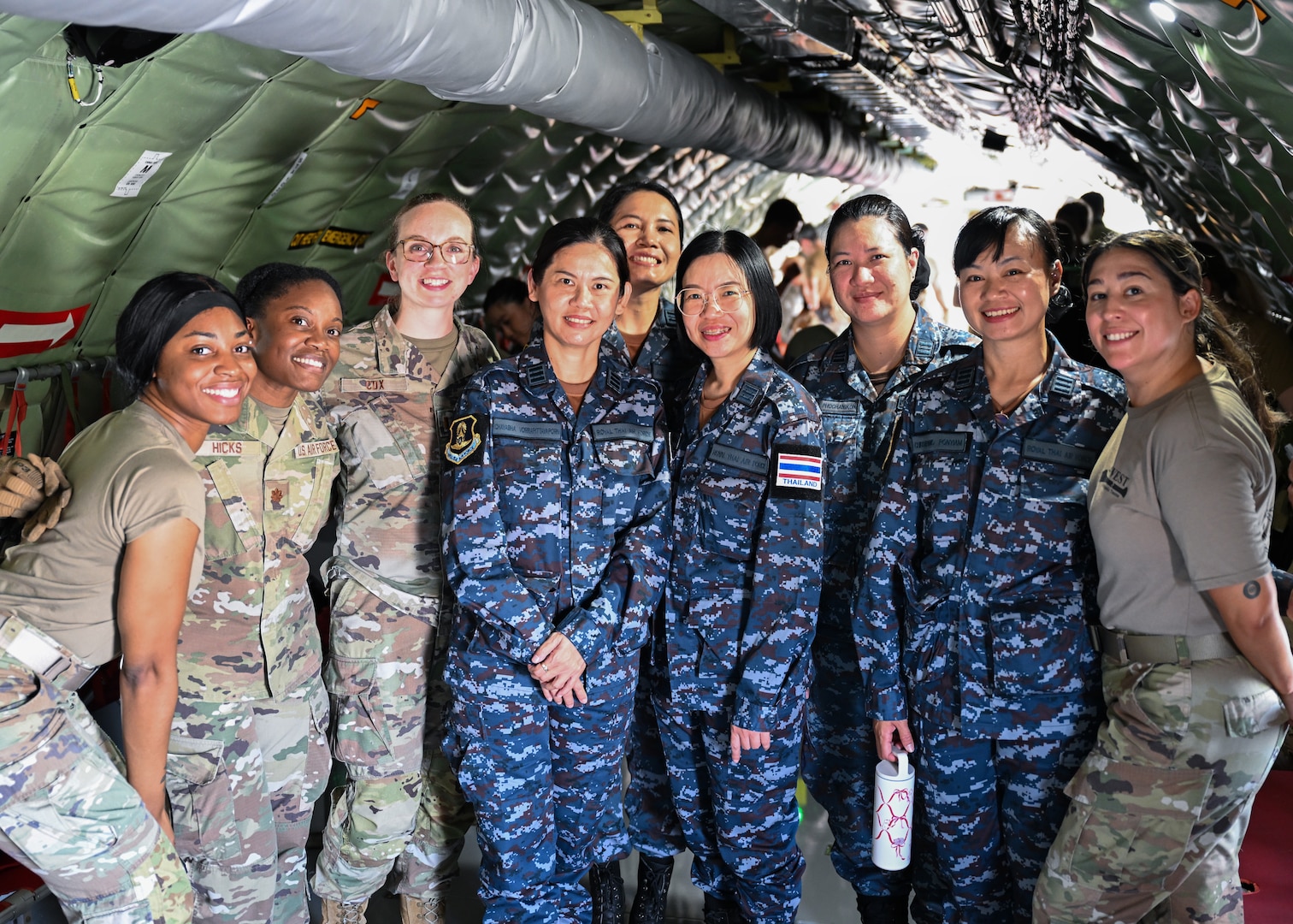 Royal Thai Air Force nurses pose with U.S. Air Force personnel aboard a Lockheed C-5 Galaxy at Joint Base San Antonio-Lackland, Texas Sept. 9, 2024.