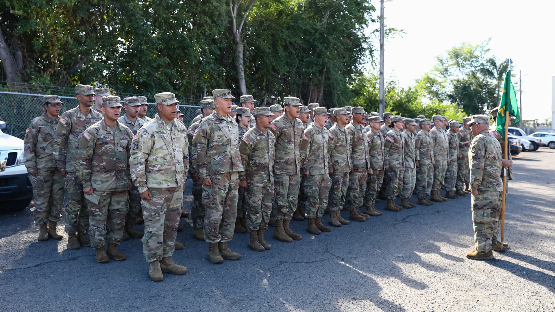 U.S. Soldiers assigned to the 755th Military Police Company of the 92nd Military Police Brigade, Puerto Rico Army National Guard, stand in formation at Luis Muñoz Marín International Airport, San Juan, Puerto Rico, Nov. 3, 2024