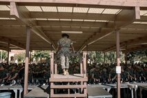 U.S. Marine Corps Sgt. Rafael Garcia Jr., a drill instructor with India Company, 3rd Recruit Training Battalion, observes recruits cleaning rifles during a M16A4 service rifle de-issue at Marine Corps Recruit Depot San Diego, California, Oct. 23, 2024. After carrying their rifles throughout recruit training the new Marines will properly clean and de-issue their rifles to extend the life of the rifles and allow more time to maintain them for future recruits. (U.S. Marine Corps photo by Cpl. Sarah M. Grawcock)