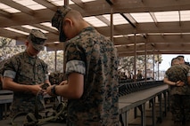 A U.S. Marine with India Company, 3rd Recruit Training Battalion, cleans a rifle during a M16A4 service rifle de-issue at Marine Corps Recruit Depot San Diego, California, Oct. 23, 2024. After carrying their rifles throughout recruit training the new Marines will properly clean and de-issue their rifles to extend the life of the rifles and allow more time to maintain them for future recruits. (U.S. Marine Corps photo by Cpl. Sarah M. Grawcock)