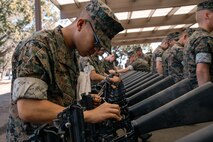 U.S. Marines with India Company, 3rd Recruit Training Battalion, clean their rifles during a M16A4 service rifle de-issue at Marine Corps Recruit Depot San Diego, California, Oct. 23, 2024. After carrying their rifles throughout recruit training the new Marines will properly clean and de-issue their rifles to extend the life of the rifles and allow more time to maintain them for future recruits. (U.S. Marine Corps photo by Cpl. Sarah M. Grawcock)