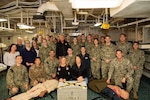 241017-N-KC192-1110 NORFOLK, Va. (Oct. 17, 2024) Sailors, Soldiers and educators take an environmental portrait after dental officer triage training aboard the Wasp-class amphibious assault ship USS Iwo Jima (LHD 7), Oct. 17, 2024. Over the course of three days, Army and Navy dental officers from Iwo Jima, Navy Medicine Readiness and Training Command (NMRTC) Portsmouth and Fort Gregg-Adams Dental Clinic Command conducted mass casualty, tactical combat casualty care, and triage training. (U.S. Navy photo by Mass Communication Specialist 2nd Class Levi Decker)