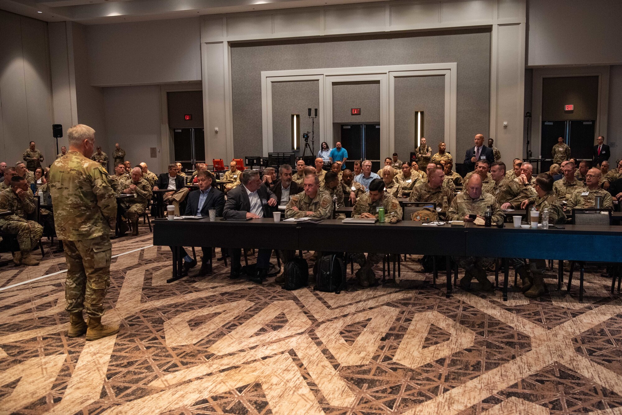 Commander talking to group of people