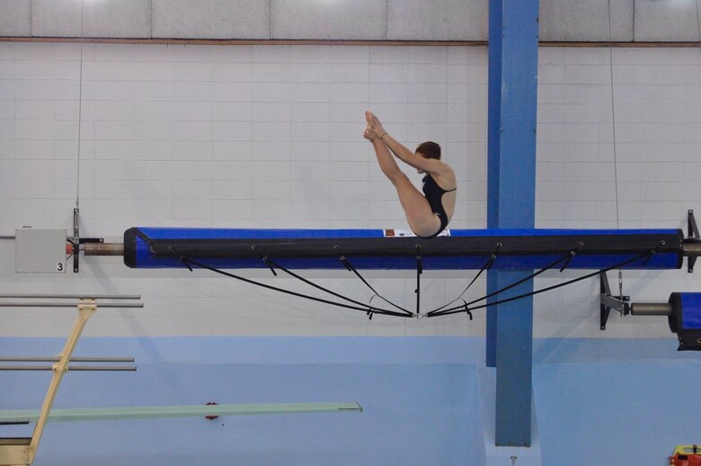 Allison Stefanelli diving for The University of New Hampshire