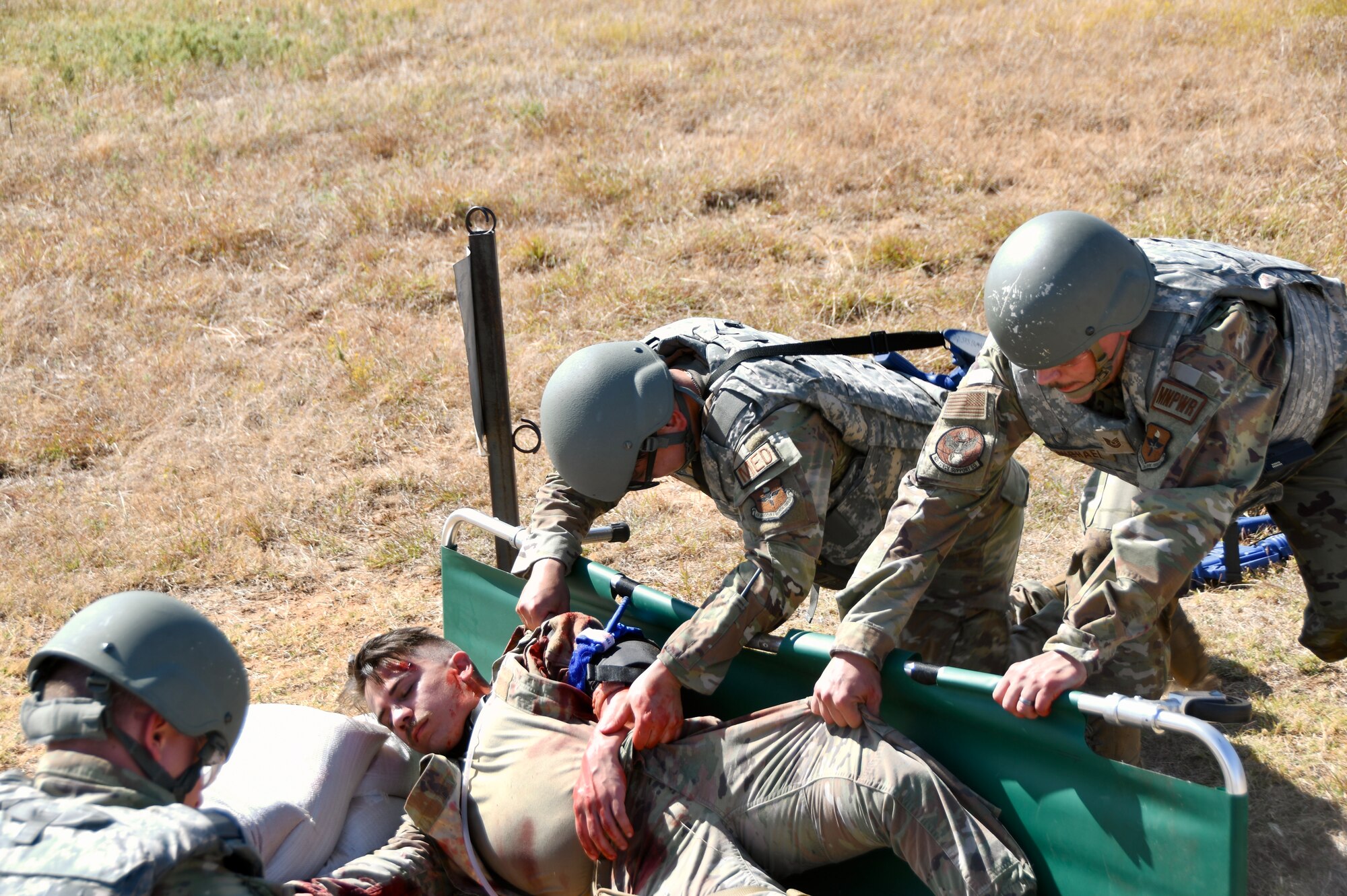 Airmen administer combat care during a Mission Ready Airman exercise Oct. 21-24, 2024, at Sheppard Air Force Base, Texas.