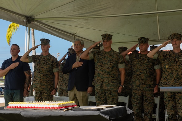 Distinguished guests render honors during the presentation of colors at a Marine Corps birthday ceremony on Joint Base Pearl Harbor-Hickam, Hawaii, Oct. 31, 2024. DPAA Marines were joined by Marine Corps Forces, Pacific senior leaders and DPAA senior leadership to celebrate the 249th Marine Corps birthday, highlighting the overlap of commitment, pride, and professionalism these two organizations share. DPAA's mission is to provide the fullest possible accounting of U.S. personnel to their families and the nation. (U.S Marine Corps photo by Sgt. Lesley Cisneros)