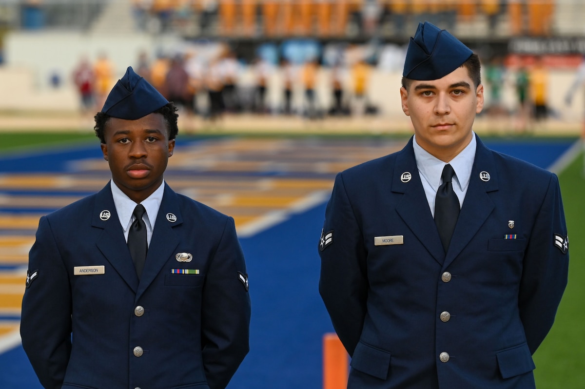 Airman Justin Anderson, 17th Force Support Squadron Military Personnel Flight member and Airman 1st Class Jason Moore, 17th Operational Medical Readiness Squadron pharmacy technician volunteer at the annual Angelo State University Military Appreciation Game at the 1st Community Credit Union Field at LeGrand Stadium, San Angelo, Texas, Nov. 2, 2024. Goodfellow and the city of San Angelo lead the Air Force in active community partnerships. (U.S. Air Force photo by Airman 1st Class James Salellas)