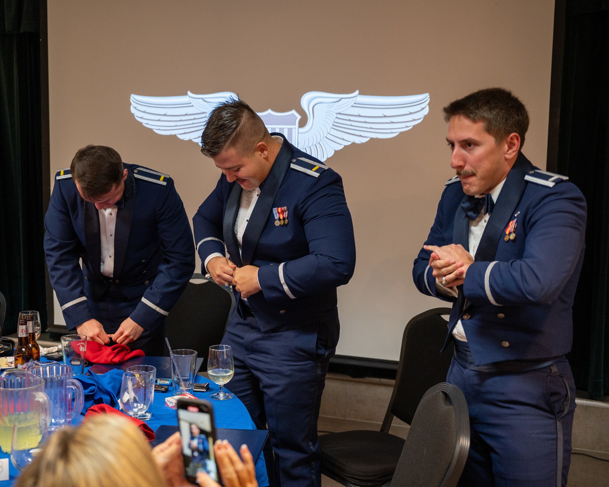 Student pilots from Class 25-02 participate in the "Breaking of the Wings" at Laughlin Air Force Base, Texas, Nov. 1, 2024. (U.S. Air Force photo by Staff Sgt. Nicholas Larsen)