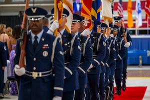 Airmen from the Steel Talons Honor Guard depart after presenting the colors during the 2024 Holloman Air Force Ball at Holloman Air Force Base, New Mexico, Nov. 2, 2024.