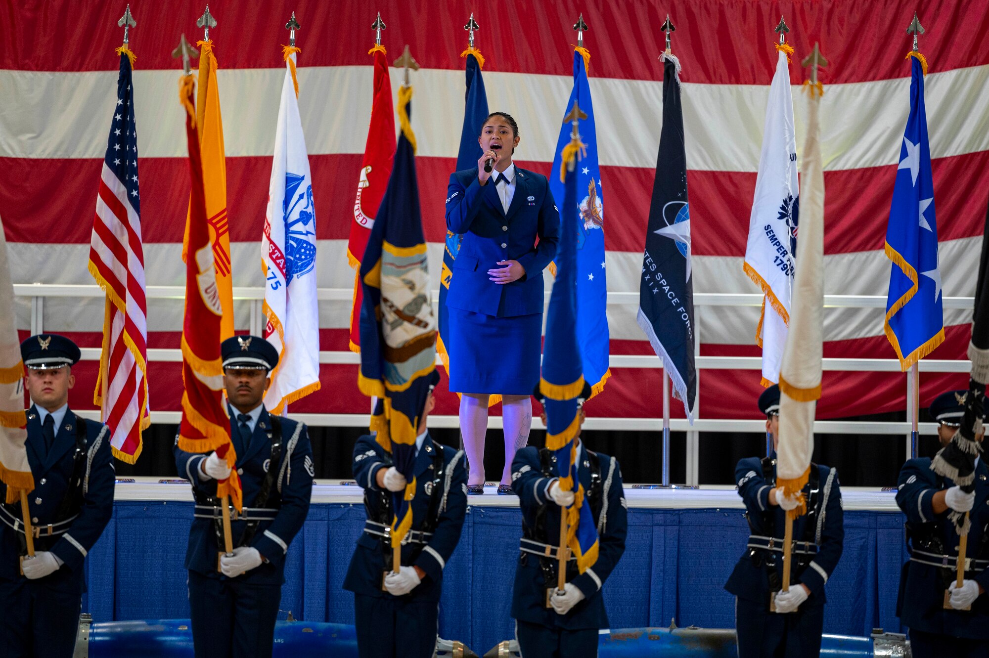 U.S. Air Force Airman 1st Class June Siaosi, 49th Force Support Squadron fitness center apprentice, performs the National Anthem during the 2024 Holloman Air Force Ball at Holloman Air Force Base, New Mexico, Nov. 2, 2024.