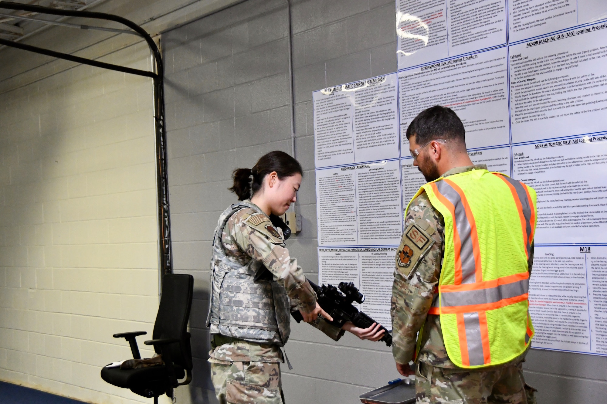 Airmen checks a weapon during a Mission Ready Airman exercise Oct. 21-24, 2024, at Sheppard Air Force Base, Texas.