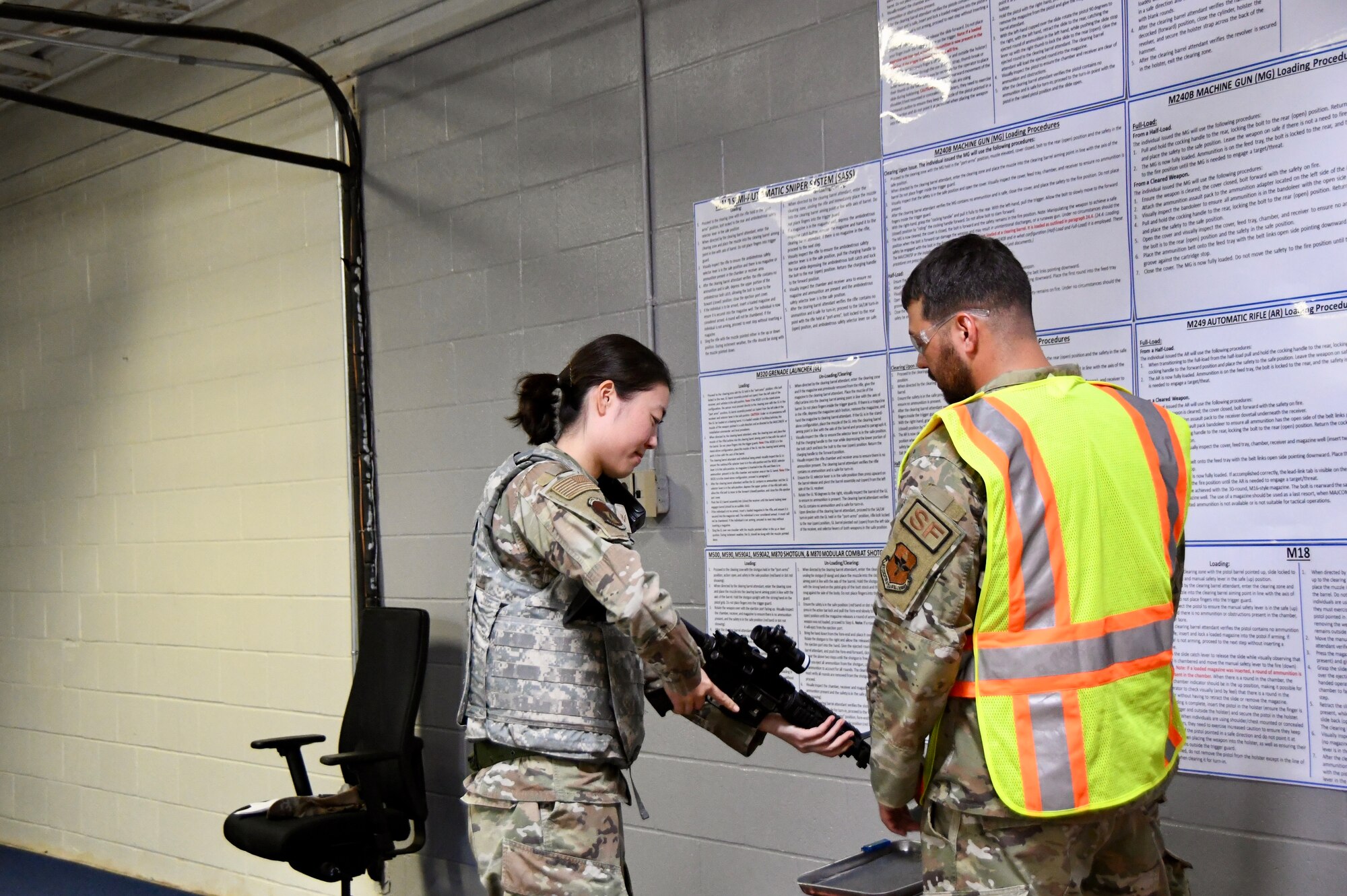 Airmen checks a weapon during a Mission Ready Airman exercise Oct. 21-24, 2024, at Sheppard Air Force Base, Texas.