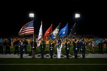 The Goodfellow Air Force Base Joint Service Color Guard presents each service flag during the halftime show during the Angelo State University Military Appreciation Game at the 1st Community Credit Union Field at LeGrand Stadium, San Angelo, Texas, Nov. 2, 2024. Volunteers from Goodfellow presented the state flags at halftime, U.S. Air Force Col. Angelina Maguinness, 17th Training Wing Commander, administered the oath of enlistment to Delayed Entry Program recruits to make the first play of their journey in joining the world’s greatest Air Force. (U.S. Air Force photo by Airman 1st Class Madi Collier)
