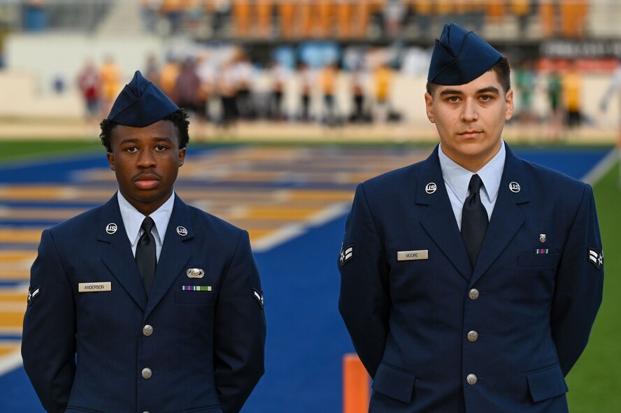 Airman Justin Anderson, 17th Force Support Squadron Military Personnel Flight member and Airman 1st Class Jason Moore, 17th Operational Medical Readiness Squadron pharmacy technician volunteer at the annual Angelo State University Military Appreciation Game at the 1st Community Credit Union Field at LeGrand Stadium, San Angelo, Texas, Nov. 2, 2024. Goodfellow and the city of San Angelo lead the Air Force in active community partnerships. (U.S. Air Force photo by Airman 1st Class James Salellas)