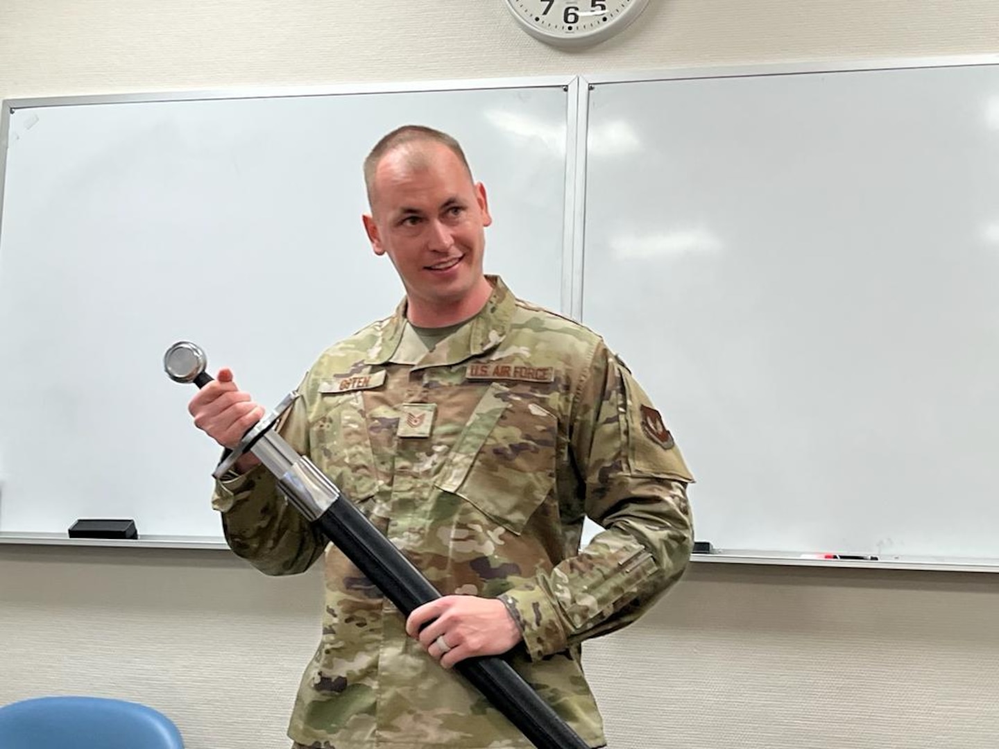 Service Member poses for a photo