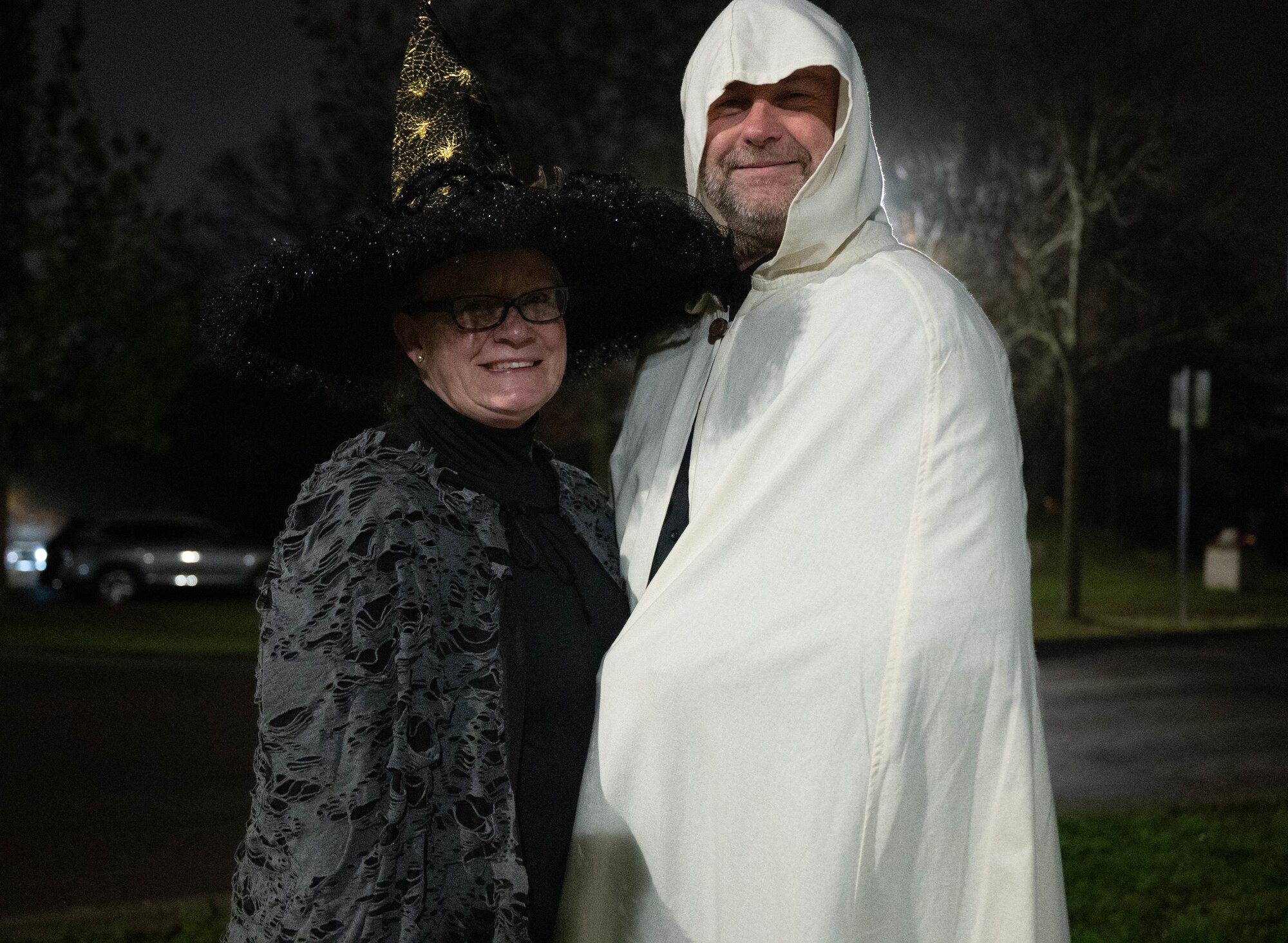 U.S. Air Force Brig. Gen. Adrienne L. Williams, 86th Airlift Wing commander, and her husband, Rodney, pose for a photo while trick-or-treating.
