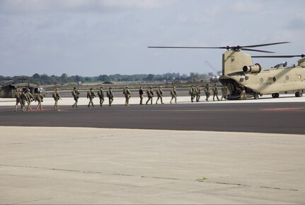 Leapfest paratroopers load a CH-47