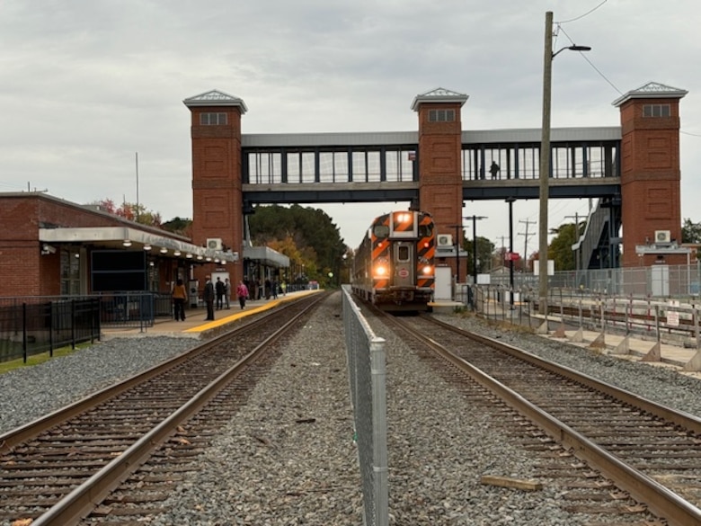 A photo featuring the newly outside area at the Quantico Train Station on Marine Corps Base Quantico, Nov 1, 2024. The outside renovations include three extended platforms, a pedestrian bridge and a third rail. The re-opening comes after a multi year project that improved the transit efficiency and commuter experience for the 6,000 daily passengers who use and pass through the station. (U.S. Marine Corps photo by Charles F. Wolf)
