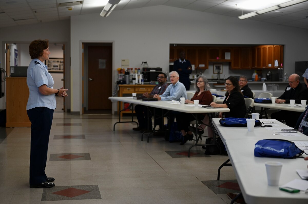 U.S. Air Force Col. Angelina Maguinness, 17th Training Wing commander, briefs visitors during Partners in Ministry Day at the Taylor Chapel, Goodfellow Air Force Base, Texas, Nov. 1, 2024. The event brought together on and off-base ministry leaders to discuss how best to support the spiritual needs of Goodfellow’s military community. (U.S. Air Force photo by Airman 1st Class Madi Collier)