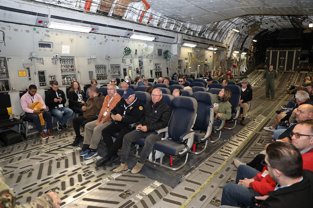 More than 40 employers of 445th Airlift Wing reservists took to the skies during a C-17 Globemaster III flight as part of the wing's Employer Appreciation Day Nov. 2, 2024. Employers were treated to breakfast and lunch and had the opportunity to participate in demonstrations by 445th Operations Support Squadron’s Aircrew Flight Equipment, 445th Security Forces Squadron, 445th Aeromedical Staging Squadron and the flight  with 445th Aeromedical Evacuation Squadron Airmen on board providing demonstrations of what they do and allowing the employers to participate as patients.