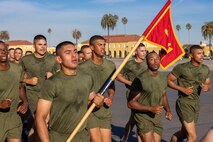 The new U.S. Marines of India Company, 3rd Recruit Training Battalion, participate in a motivational run at Marine Corps Recruit Depot San Diego, California, Oct. 24, 2024. The company motivational run is a three-mile cadence run conducted around the Depot and is the last physical training event the Marines will conduct before they graduate from MCRD San Diego. The event is also the first-time friends and families will see their newly transformed Marines. (U.S. Marine Corps photo by Lance Cpl. Jacob Hutchinson)