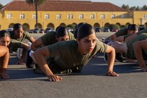 The new U.S. Marines of India Company, 3rd Recruit Training Battalion, execute dynamic warm-ups prior to the company motivational run at Marine Corps Recruit Depot San Diego, California, Oct. 24, 2024. The company motivational run is a three-mile cadence run conducted around the Depot and is the last physical training event the Marines will conduct before they graduate from MCRD San Diego. The event is also the first-time friends and families will see their newly transformed Marines. (U.S. Marine Corps photo by Lance Cpl. Jacob Hutchinson)