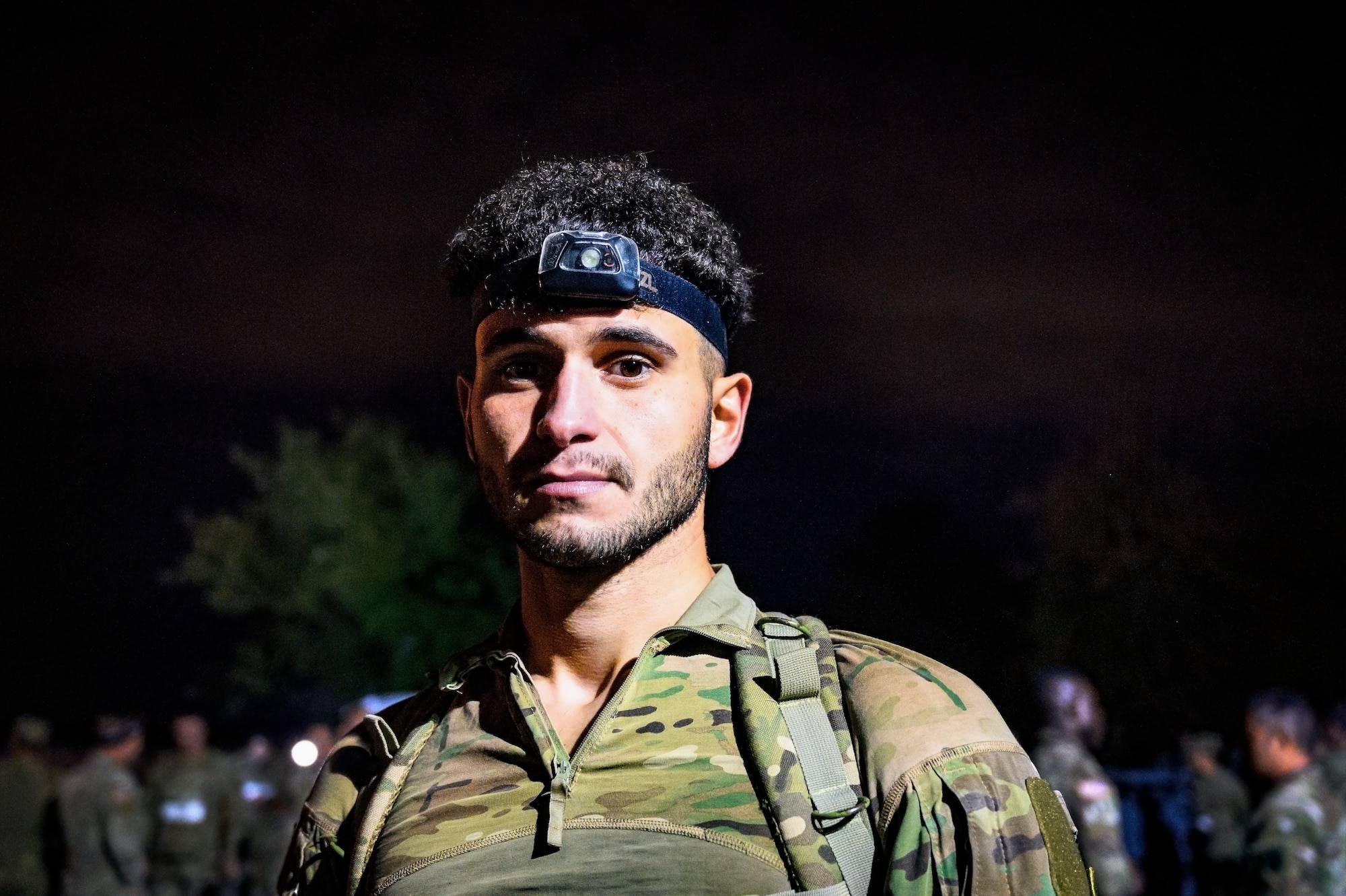 U.S. Army Spc. Kyle Labarca, 174th Infantry Brigade infantryman, poses for a photo during the Norwegian Foot March at JB MDL, N.J., Oct. 13, 2024. The Norwegian Foot March is a military endurance test where participants march or run an 18.6-mile-long route, carrying a rucksack of 24 lbs. (U.S. Air Force photo by Senior Airman Matt Porter)