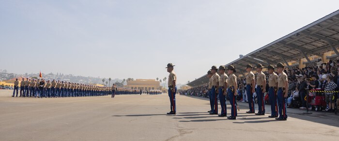 New U.S. Marines with India Company, 3rd Recruit Training Battalion, march in formation prior to a graduation ceremony at Marine Corps Recruit Depot San Diego, California, Oct. 25, 2024. This ceremony marked the end of a 13-week transformation that included training in drill, marksmanship, basic combat skills, and Marine Corps customs and traditions. (U.S. Marine Corps photo by Lance Cpl. Janell B. Alvarez)