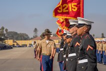 New U.S. Marines with India Company, 3rd Recruit Training Battalion, stand in formation prior to returning the guidons during a graduation ceremony at Marine Corps Recruit Depot San Diego, California, Oct. 25, 2024. This ceremony marked the end of a 13-week transformation that included training in drill, marksmanship, basic combat skills, and Marine Corps customs and traditions. (U.S. Marine Corps photo by Lance Cpl. Janell B. Alvarez)