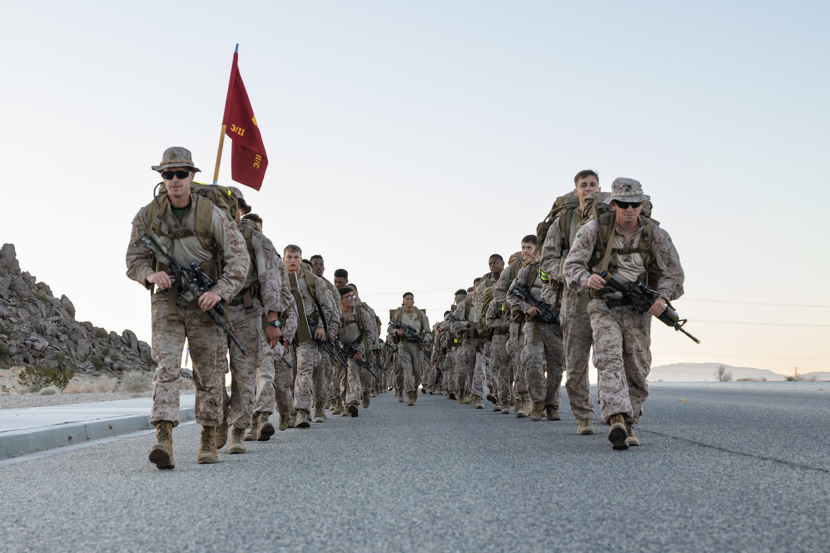 U.S. Marines with 3rd Battalion, 11th Marine Regiment, 1st Marine Division, conduct a 9-mile hike at Marine Corps Air-Ground Combat Center, Twentynine Palms, California, Sept. 14, 2023. 3rd Battalion, 11th Marine Regiment, will be deploying overseas and has completed a variety of physical training events to ensure mission readiness and success. (U.S. Marine Corps photo by Cpl. Andrew Bray)