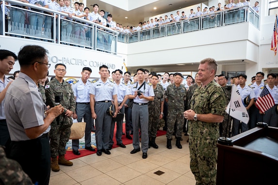 Adm. Samuel J. Paparo, commander of U.S. Indo-Pacific Command, speaks with cadets from the Korea Military Academy during their visit to USINDOPACOM headquarters on Camp H.M. Smith, Hawaii, Nov. 5, 2024. USINDOPACOM is committed to enhancing stability in the Indo-Pacific region by promoting security cooperation, encouraging peaceful development, responding to contingencies, deterring aggression and, when necessary, fighting to win. (U.S. Navy photo by Chief Mass Communication Specialist Shannon M. Smith)