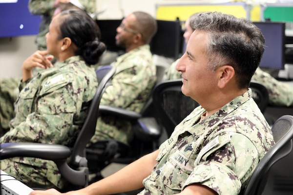 Medical Command Post Exercise (CPX) team members from the Naval Medical Forces Pacific, Navy Medicine Readiness and Training Command (NMRTC) San Diego, NMRTC Yokosuka, NMRTC Guam, NMRTC Camp Pendleton, and elements of Expeditionary Medical Facility (EMF) 150-Alpha listen to a CPX update briefing, Oct. 31. The three-day exercise held at Naval Medical Center San Diego, a component of Keen Sword 25, brought together personnel from multiple commands to ensure coordinated Health Service Support (HHS) for operations in the Indo-Pacific region. Keen Sword is a biennial, joint and bilateral field-training exercise involving U.S. military and Japan Self-Defense Forces personnel, designed to increase readiness and interoperability while strengthening the U.S.-Japan alliance.