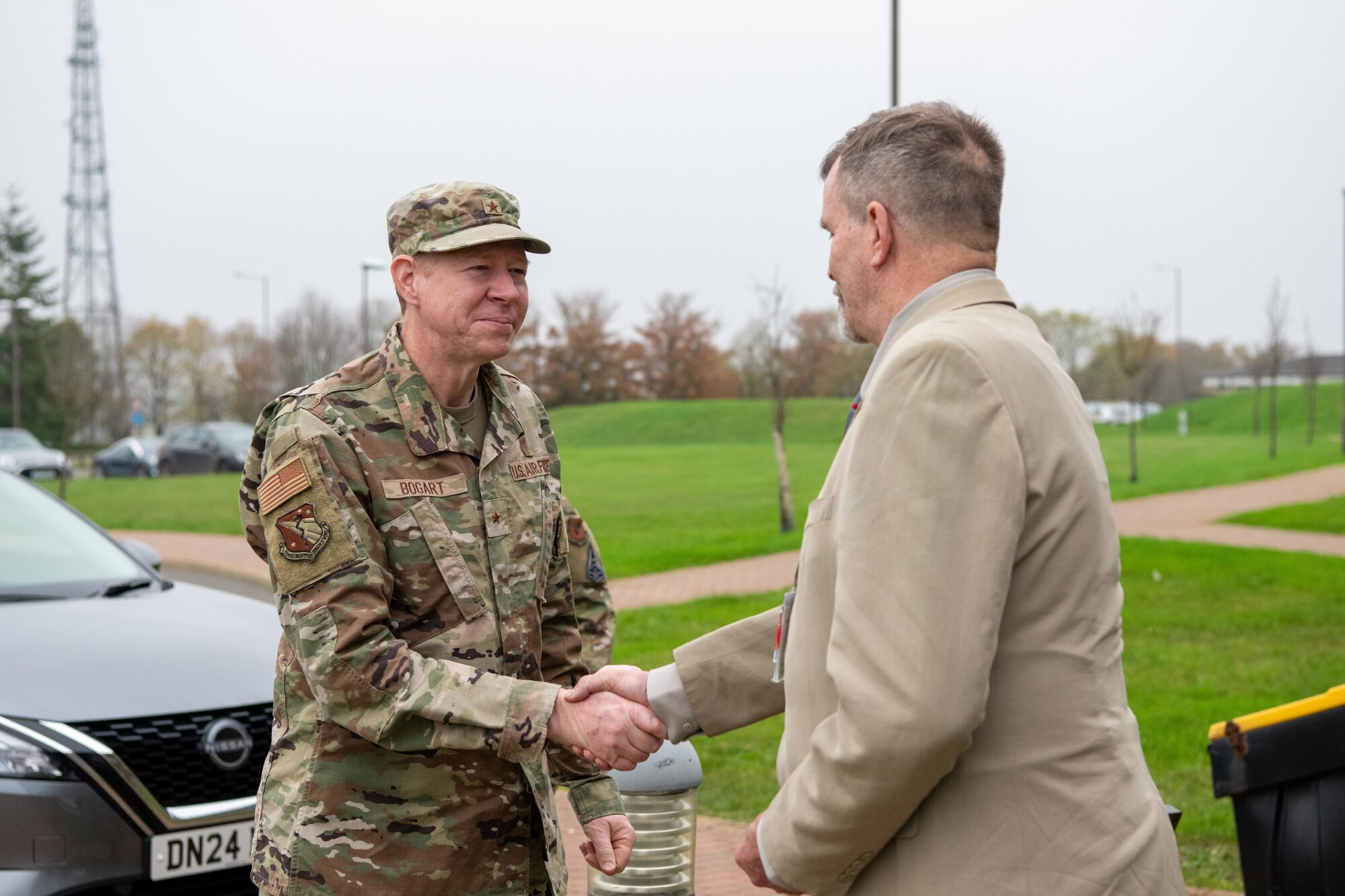Airmen shake hands