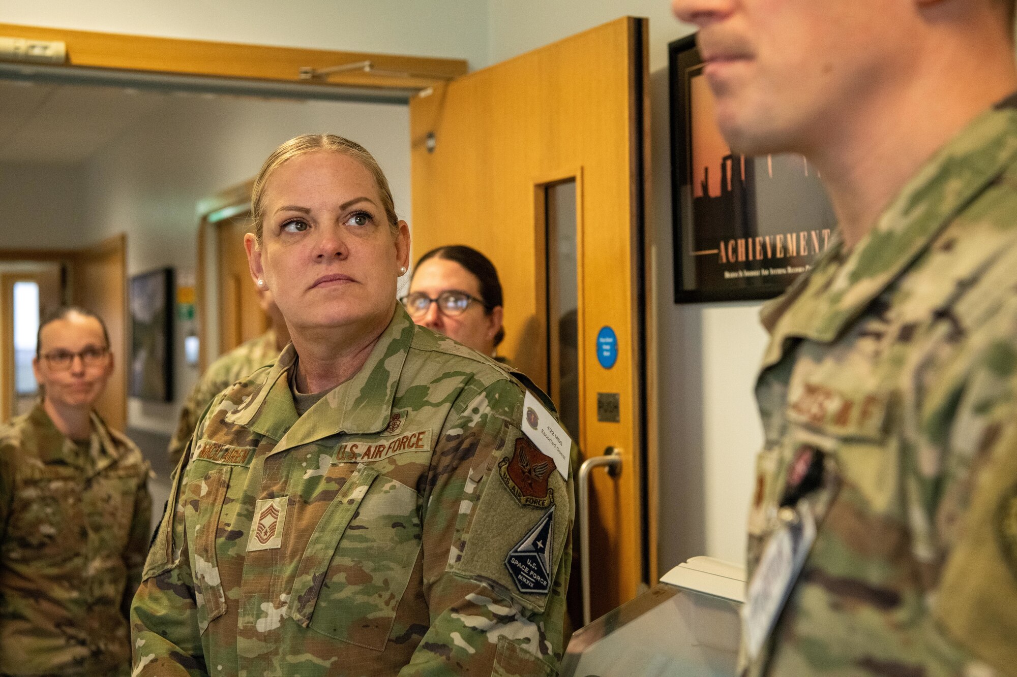 Airman listens to a brief