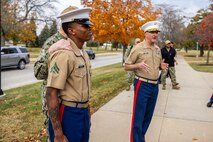 U.S. Marine Corps Cpl. Keyon Halley, an administrative clerk with 9th Marine Corps District, left, is recognized by Col. Aaron Lloyd, 9th Marine Corps District Commanding Officer, during a visit from U.S. Navy Adm. Christopher Grady, Vice Chairman of the Joint Chiefs of Staff, to the 9th Marine Corps District Headquarters at Naval Station Great Lakes, Ill. Oct. 30, 2024. Adm. Grady made the visit to discuss and receive a briefing about the recruiting mission in the Midwestern United States, as well as to recognize outstanding Marines within the district headquarters. (U.S. Marine Corps photo by Cpl. Maxwell Cook)