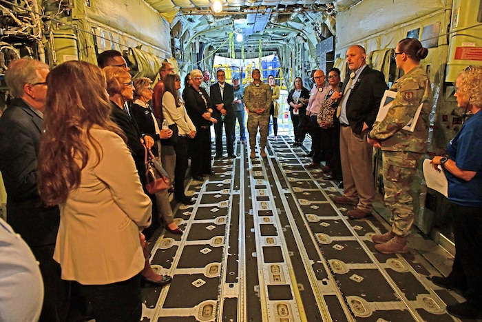 Photo shows group of people inside aircraft