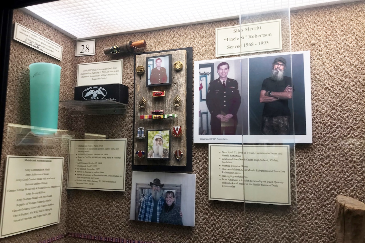 A museum exhibit shows both military and civilian memorabilia.